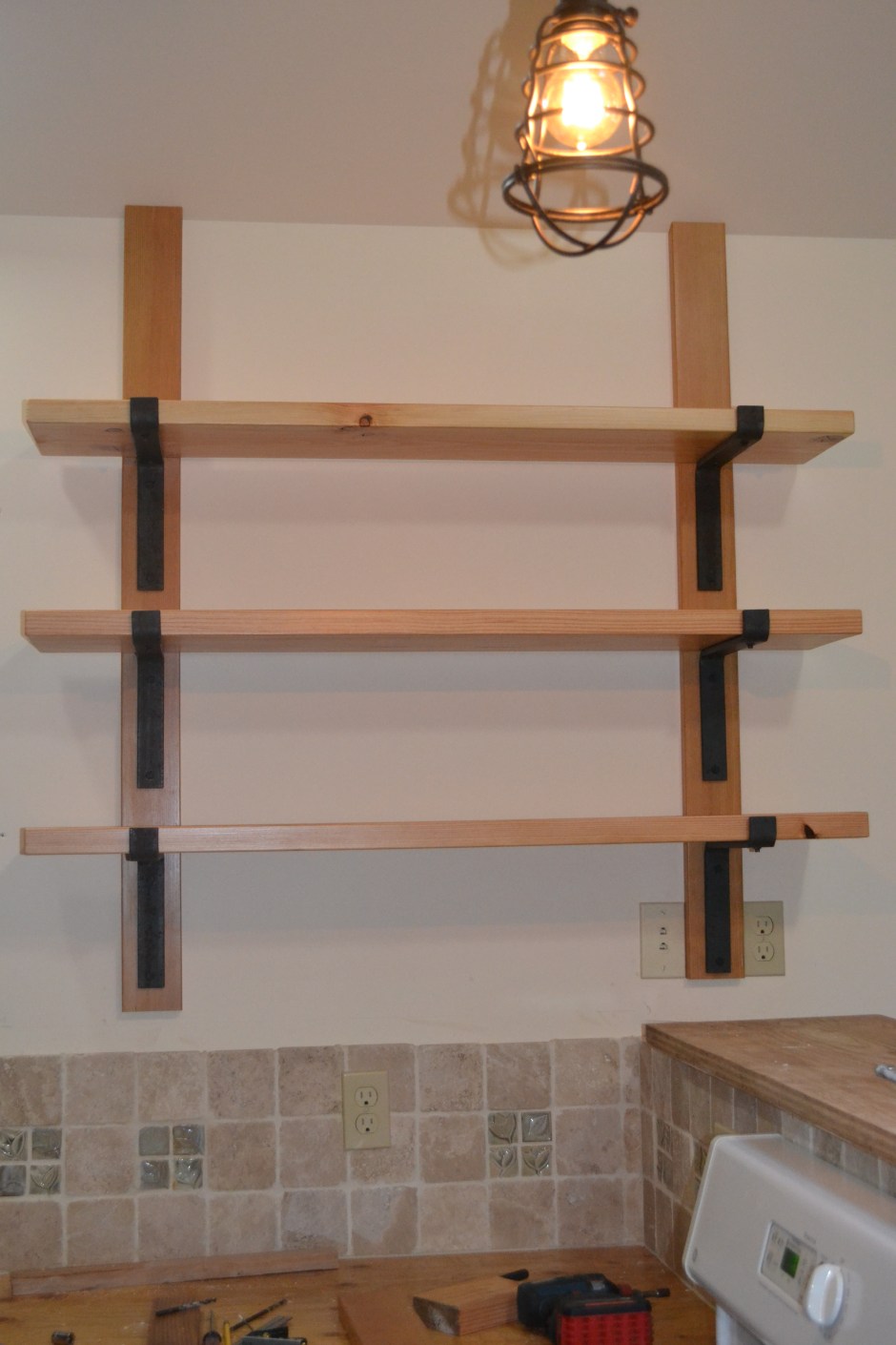 Custom wood shelves with metal brackets